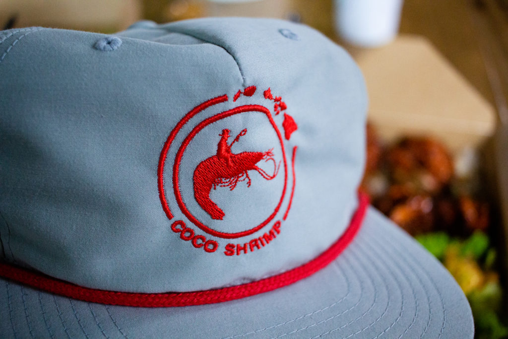 Hat with Shrimp in the background.